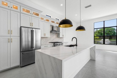 This amazing view complements the beautiful fully renovated 3 on BallenIsles Golf and Country Club in Florida - for sale on GolfHomes.com, golf home, golf lot