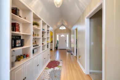 Spectacular waterfront home on Lake Arbu w/ panoramic water on Players Course At Wyboo Plantation in South Carolina - for sale on GolfHomes.com, golf home, golf lot