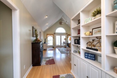 Spectacular waterfront home on Lake Arbu w/ panoramic water on Players Course At Wyboo Plantation in South Carolina - for sale on GolfHomes.com, golf home, golf lot