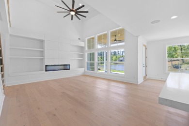 THIS GORGEOUS NEW CONSTRUCTION IS DIRECTLY ON OSPREY POINTE POND on Harbor Club Golf and Country Club in Georgia - for sale on GolfHomes.com, golf home, golf lot