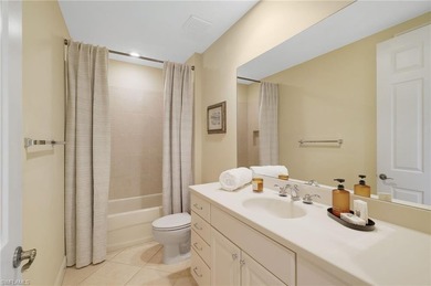 Experience serene lakefront living in this beautiful spacious on Miromar Lakes Golf Club in Florida - for sale on GolfHomes.com, golf home, golf lot