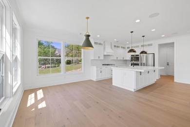THIS GORGEOUS NEW CONSTRUCTION IS DIRECTLY ON OSPREY POINTE POND on Harbor Club Golf and Country Club in Georgia - for sale on GolfHomes.com, golf home, golf lot