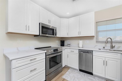 Under contract-accepting backup offers. Light, bright, and on Saint Andrews South Golf Club in Florida - for sale on GolfHomes.com, golf home, golf lot