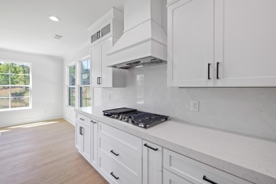 THIS GORGEOUS NEW CONSTRUCTION IS DIRECTLY ON OSPREY POINTE POND on Harbor Club Golf and Country Club in Georgia - for sale on GolfHomes.com, golf home, golf lot