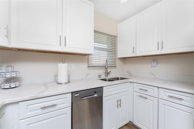 Under contract-accepting backup offers. Light, bright, and on Saint Andrews South Golf Club in Florida - for sale on GolfHomes.com, golf home, golf lot