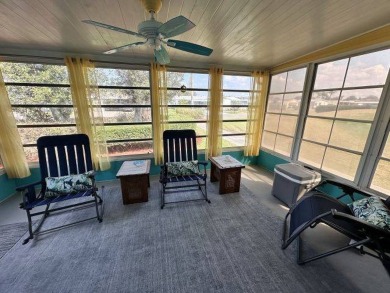 Located on a prime corner lot directly across from the clubhouse on Four Lakes Golf Club in Florida - for sale on GolfHomes.com, golf home, golf lot
