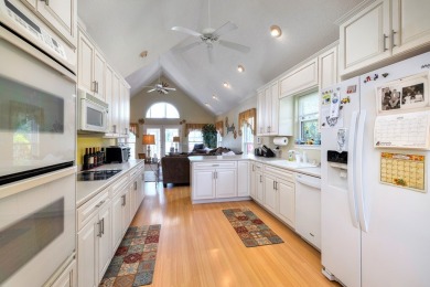 Spectacular waterfront home on Lake Arbu w/ panoramic water on Players Course At Wyboo Plantation in South Carolina - for sale on GolfHomes.com, golf home, golf lot