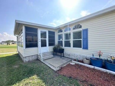 Located on a prime corner lot directly across from the clubhouse on Four Lakes Golf Club in Florida - for sale on GolfHomes.com, golf home, golf lot