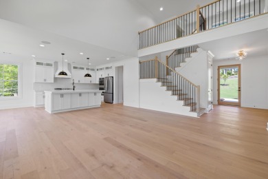 THIS GORGEOUS NEW CONSTRUCTION IS DIRECTLY ON OSPREY POINTE POND on Harbor Club Golf and Country Club in Georgia - for sale on GolfHomes.com, golf home, golf lot