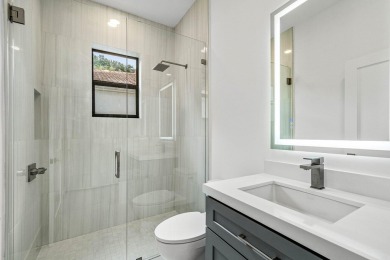 This amazing view complements the beautiful fully renovated 3 on BallenIsles Golf and Country Club in Florida - for sale on GolfHomes.com, golf home, golf lot