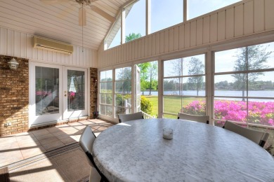 Spectacular waterfront home on Lake Arbu w/ panoramic water on Players Course At Wyboo Plantation in South Carolina - for sale on GolfHomes.com, golf home, golf lot