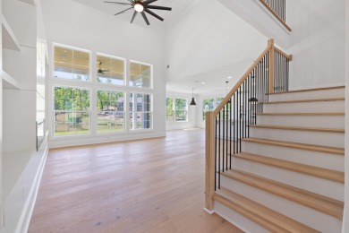 THIS GORGEOUS NEW CONSTRUCTION IS DIRECTLY ON OSPREY POINTE POND on Harbor Club Golf and Country Club in Georgia - for sale on GolfHomes.com, golf home, golf lot