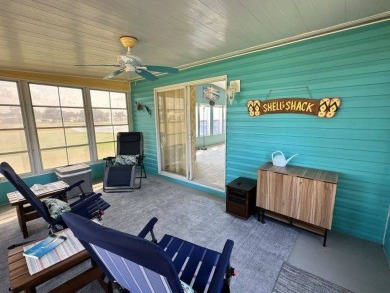 Located on a prime corner lot directly across from the clubhouse on Four Lakes Golf Club in Florida - for sale on GolfHomes.com, golf home, golf lot