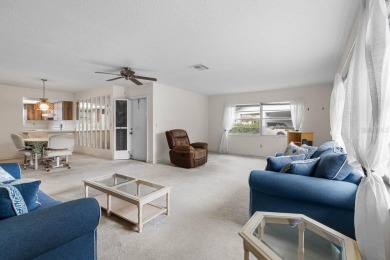 Welcome to this 2-bedroom, 2-bath home located in the highly on Falcon Watch Golf Club in Florida - for sale on GolfHomes.com, golf home, golf lot