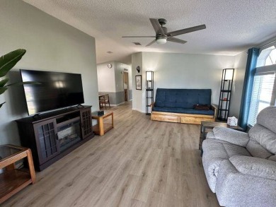 Located on a prime corner lot directly across from the clubhouse on Four Lakes Golf Club in Florida - for sale on GolfHomes.com, golf home, golf lot