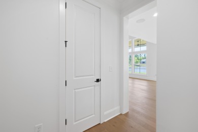 THIS GORGEOUS NEW CONSTRUCTION IS DIRECTLY ON OSPREY POINTE POND on Harbor Club Golf and Country Club in Georgia - for sale on GolfHomes.com, golf home, golf lot