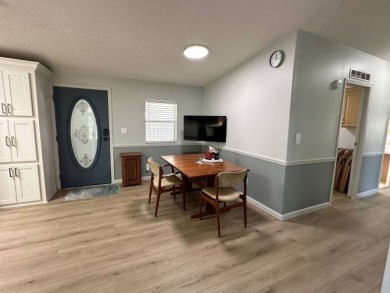 Located on a prime corner lot directly across from the clubhouse on Four Lakes Golf Club in Florida - for sale on GolfHomes.com, golf home, golf lot