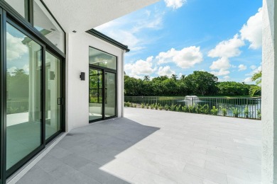 This amazing view complements the beautiful fully renovated 3 on BallenIsles Golf and Country Club in Florida - for sale on GolfHomes.com, golf home, golf lot