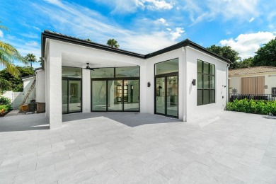 This amazing view complements the beautiful fully renovated 3 on BallenIsles Golf and Country Club in Florida - for sale on GolfHomes.com, golf home, golf lot