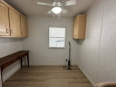 Located on a prime corner lot directly across from the clubhouse on Four Lakes Golf Club in Florida - for sale on GolfHomes.com, golf home, golf lot