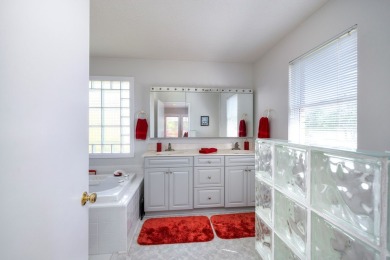 Spectacular waterfront home on Lake Arbu w/ panoramic water on Players Course At Wyboo Plantation in South Carolina - for sale on GolfHomes.com, golf home, golf lot