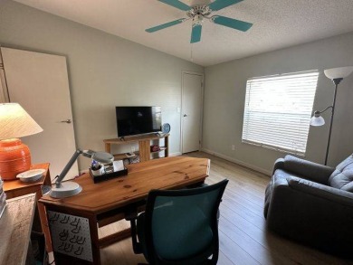 Located on a prime corner lot directly across from the clubhouse on Four Lakes Golf Club in Florida - for sale on GolfHomes.com, golf home, golf lot