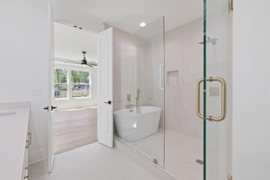 THIS GORGEOUS NEW CONSTRUCTION IS DIRECTLY ON OSPREY POINTE POND on Harbor Club Golf and Country Club in Georgia - for sale on GolfHomes.com, golf home, golf lot