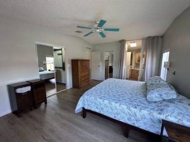 Located on a prime corner lot directly across from the clubhouse on Four Lakes Golf Club in Florida - for sale on GolfHomes.com, golf home, golf lot