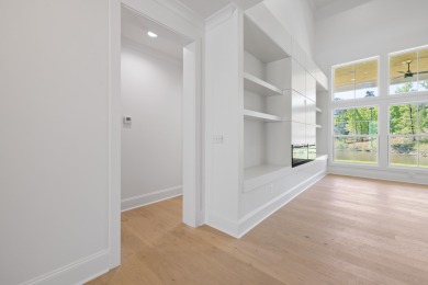 THIS GORGEOUS NEW CONSTRUCTION IS DIRECTLY ON OSPREY POINTE POND on Harbor Club Golf and Country Club in Georgia - for sale on GolfHomes.com, golf home, golf lot