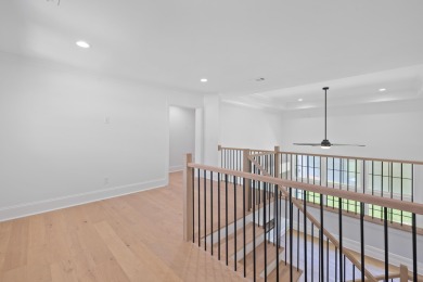 THIS GORGEOUS NEW CONSTRUCTION IS DIRECTLY ON OSPREY POINTE POND on Harbor Club Golf and Country Club in Georgia - for sale on GolfHomes.com, golf home, golf lot