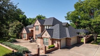 Luxurious Living Amidst Thriving Pecan Orchards in this on Pecan Plantation Country Club in Texas - for sale on GolfHomes.com, golf home, golf lot