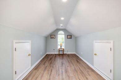 Spectacular waterfront home on Lake Arbu w/ panoramic water on Players Course At Wyboo Plantation in South Carolina - for sale on GolfHomes.com, golf home, golf lot