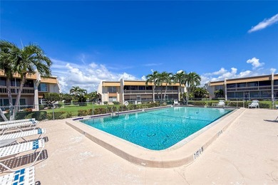 Under contract-accepting backup offers. Light, bright, and on Saint Andrews South Golf Club in Florida - for sale on GolfHomes.com, golf home, golf lot