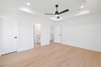 THIS GORGEOUS NEW CONSTRUCTION IS DIRECTLY ON OSPREY POINTE POND on Harbor Club Golf and Country Club in Georgia - for sale on GolfHomes.com, golf home, golf lot