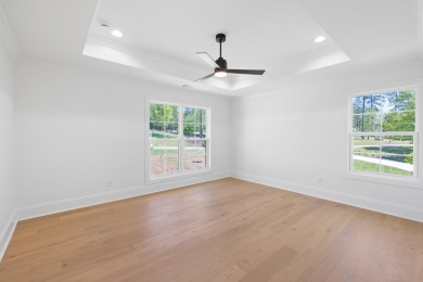 THIS GORGEOUS NEW CONSTRUCTION IS DIRECTLY ON OSPREY POINTE POND on Harbor Club Golf and Country Club in Georgia - for sale on GolfHomes.com, golf home, golf lot