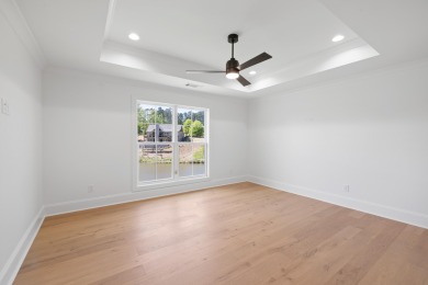 THIS GORGEOUS NEW CONSTRUCTION IS DIRECTLY ON OSPREY POINTE POND on Harbor Club Golf and Country Club in Georgia - for sale on GolfHomes.com, golf home, golf lot