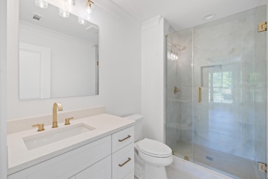 THIS GORGEOUS NEW CONSTRUCTION IS DIRECTLY ON OSPREY POINTE POND on Harbor Club Golf and Country Club in Georgia - for sale on GolfHomes.com, golf home, golf lot