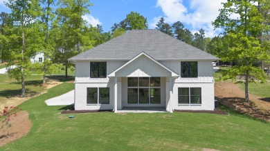 THIS GORGEOUS NEW CONSTRUCTION IS DIRECTLY ON OSPREY POINTE POND on Harbor Club Golf and Country Club in Georgia - for sale on GolfHomes.com, golf home, golf lot
