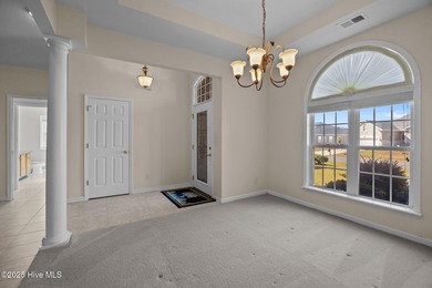 Welcome to **8887 Lansdowne Drive**, a beautiful home in the on Brunswick Plantation and Golf Resorts in North Carolina - for sale on GolfHomes.com, golf home, golf lot