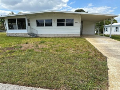 55+ gated golf course community.  (PRICE REDUCED) Newly updated on Zellwood Station Country Club in Florida - for sale on GolfHomes.com, golf home, golf lot