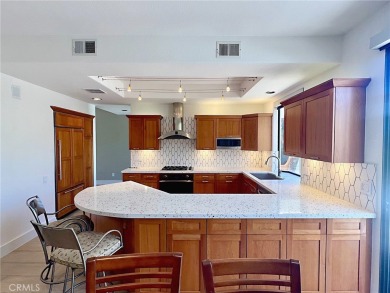 Quietly tucked away on a cul-de-sac within Mission Hills Country on Mission Hills Golf Club in California - for sale on GolfHomes.com, golf home, golf lot