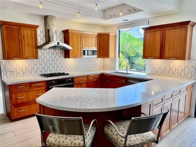 Quietly tucked away on a cul-de-sac within Mission Hills Country on Mission Hills Golf Club in California - for sale on GolfHomes.com, golf home, golf lot