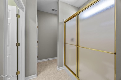 Welcome to **8887 Lansdowne Drive**, a beautiful home in the on Brunswick Plantation and Golf Resorts in North Carolina - for sale on GolfHomes.com, golf home, golf lot