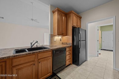 Welcome to **8887 Lansdowne Drive**, a beautiful home in the on Brunswick Plantation and Golf Resorts in North Carolina - for sale on GolfHomes.com, golf home, golf lot