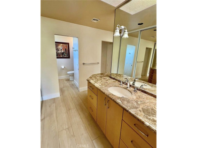 Quietly tucked away on a cul-de-sac within Mission Hills Country on Mission Hills Golf Club in California - for sale on GolfHomes.com, golf home, golf lot
