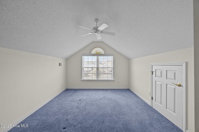 Welcome to **8887 Lansdowne Drive**, a beautiful home in the on Brunswick Plantation and Golf Resorts in North Carolina - for sale on GolfHomes.com, golf home, golf lot