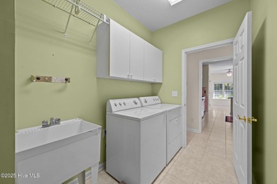 Welcome to **8887 Lansdowne Drive**, a beautiful home in the on Brunswick Plantation and Golf Resorts in North Carolina - for sale on GolfHomes.com, golf home, golf lot