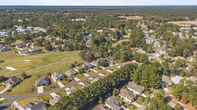 Welcome to **8887 Lansdowne Drive**, a beautiful home in the on Brunswick Plantation and Golf Resorts in North Carolina - for sale on GolfHomes.com, golf home, golf lot