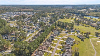 Welcome to **8887 Lansdowne Drive**, a beautiful home in the on Brunswick Plantation and Golf Resorts in North Carolina - for sale on GolfHomes.com, golf home, golf lot