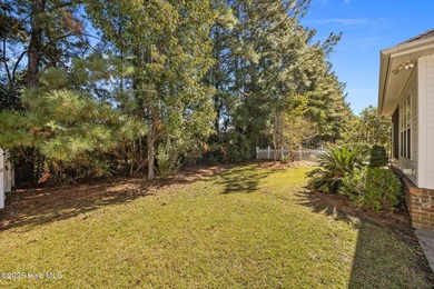 Welcome to **8887 Lansdowne Drive**, a beautiful home in the on Brunswick Plantation and Golf Resorts in North Carolina - for sale on GolfHomes.com, golf home, golf lot